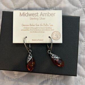 Amber earrings. 
Sterling silver
Never been worn.